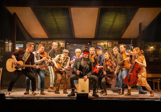 A typical scene from Once the Musical – the whole cast in full swing reminiscent of an Irish ceilidh in a Dublin pub.